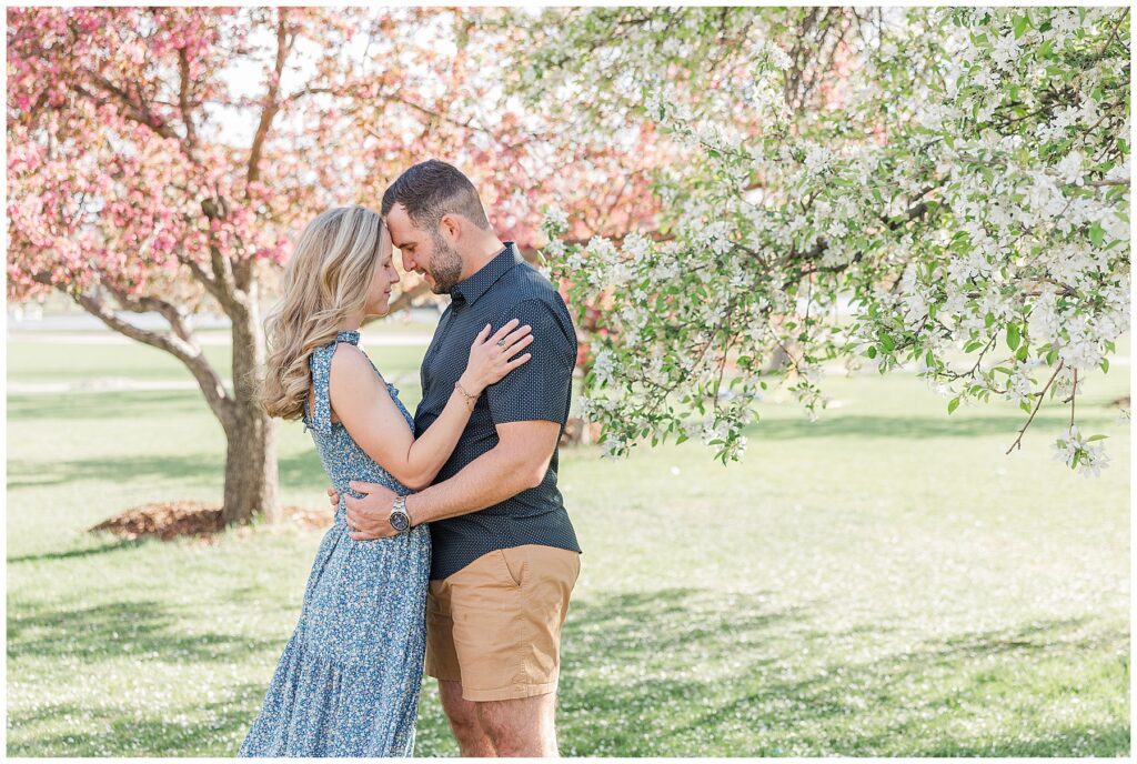 Couple pose for light and airy outdoor spring mini session photos